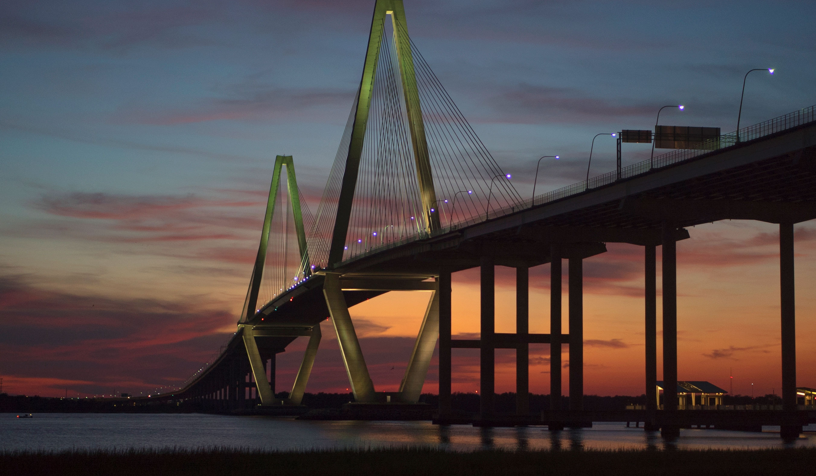 Charleston waterfront sunset and bridge